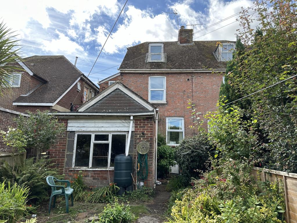 Lot: 171 - FOUR-BEDROOM SEMI-DETACHED HOUSE FOR REFURBISHMENT - Back outside of property